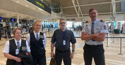 Securitas flygkontrollanter som till vardags arbetar på Malmö Airport, öppnade under veckan upp ytterligare en passage i säkerhetskontrollen på Terminal 4. Foto: Securitas Sverige.